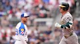 IN PHOTOS: A's beat scuffling Braves 11-9