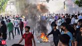 32 dead in Bangladesh unrest, protesters set fire to state TV network - The Economic Times