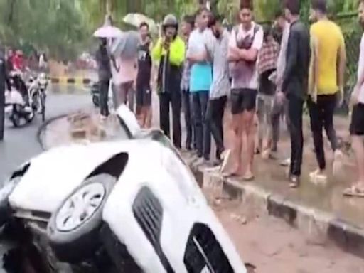 Watch: Car Falls Into A Massive Crater After Road Caves In Gujarat's Gandhinagar - News18