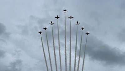 Cheers as Red Arrows fly over school's summer fair
