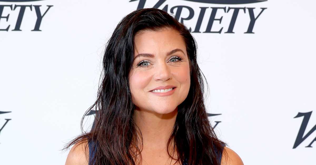 Tiffani Thiessen Fights the Heat With a Cold Plunge in Black Swimsuit