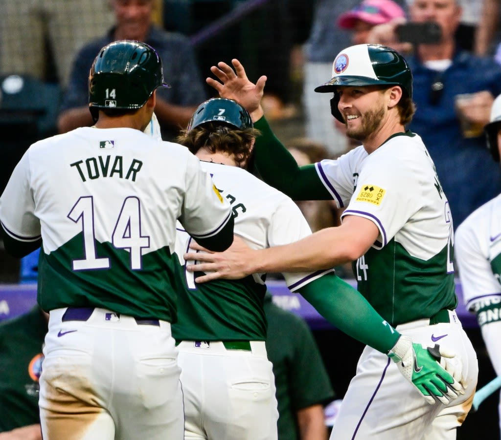 Rockies earn MLB’s first win on a pitch-clock violation in wild night at Coors Field