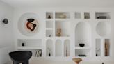 10 living rooms with creative open shelving that helps bring their owners' personality to these spaces