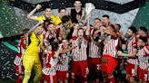 Ecstatic Olympiakos players hail team spirit for first European title win