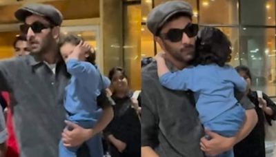 Raha Kapoor rubs her eyes and hugs dad Ranbir Kapoor as paparazzi use camera flashes