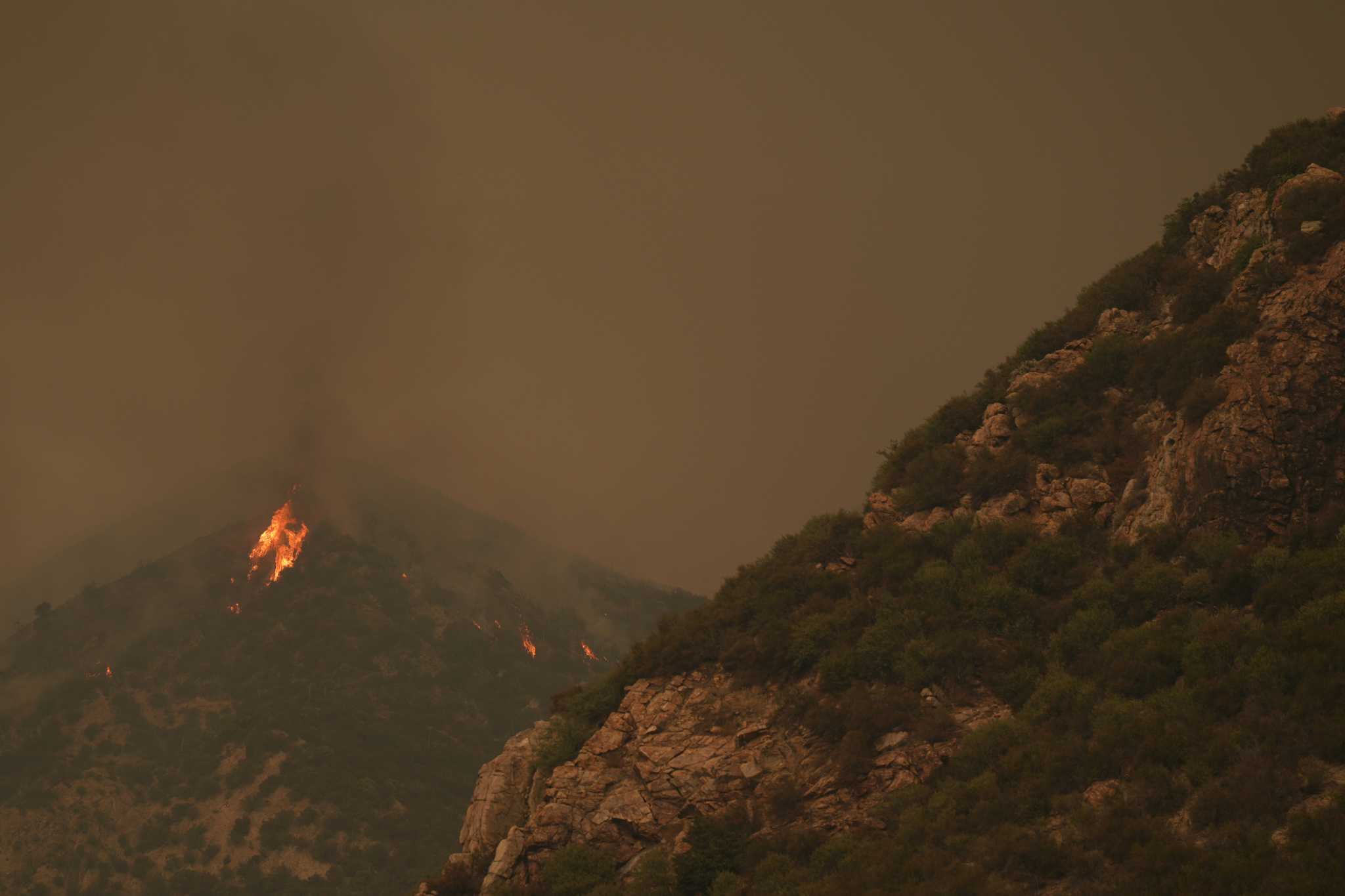 Thousands evacuate as wildfires rage outside Los Angeles and Reno, Nevada