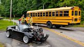 Driver freed by firefighters after colliding with school bus near Spring Grove