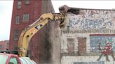 Former Downtown Froggy's Bar location under demolition for bocce courts