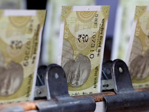 Rupee near record low, far forward premiums slump on Fed repricing