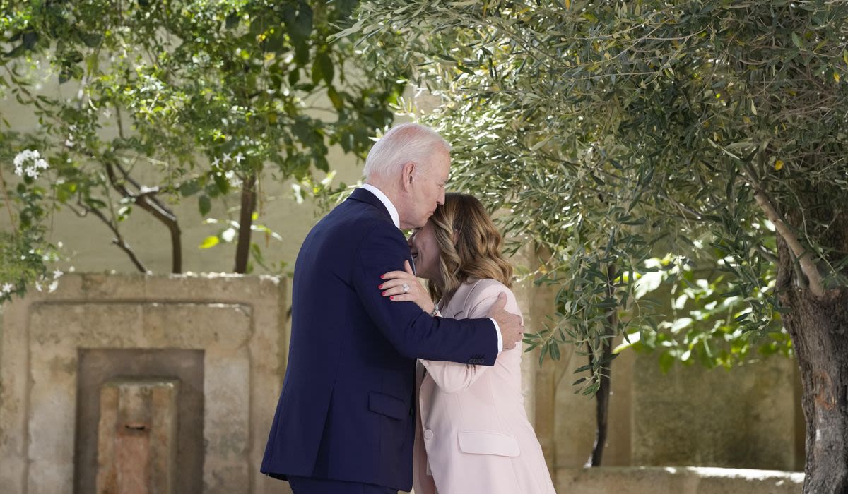 Biden kisses Italian leader Giorgia Meloni’s hair in awkward embrace at G7