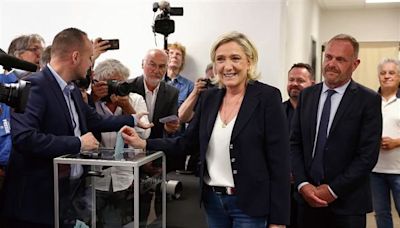 Massive turnout in France’s high-stakes elections as support for far right grows