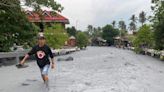 Cold lava floods Philippines village after volcano erupts miles away