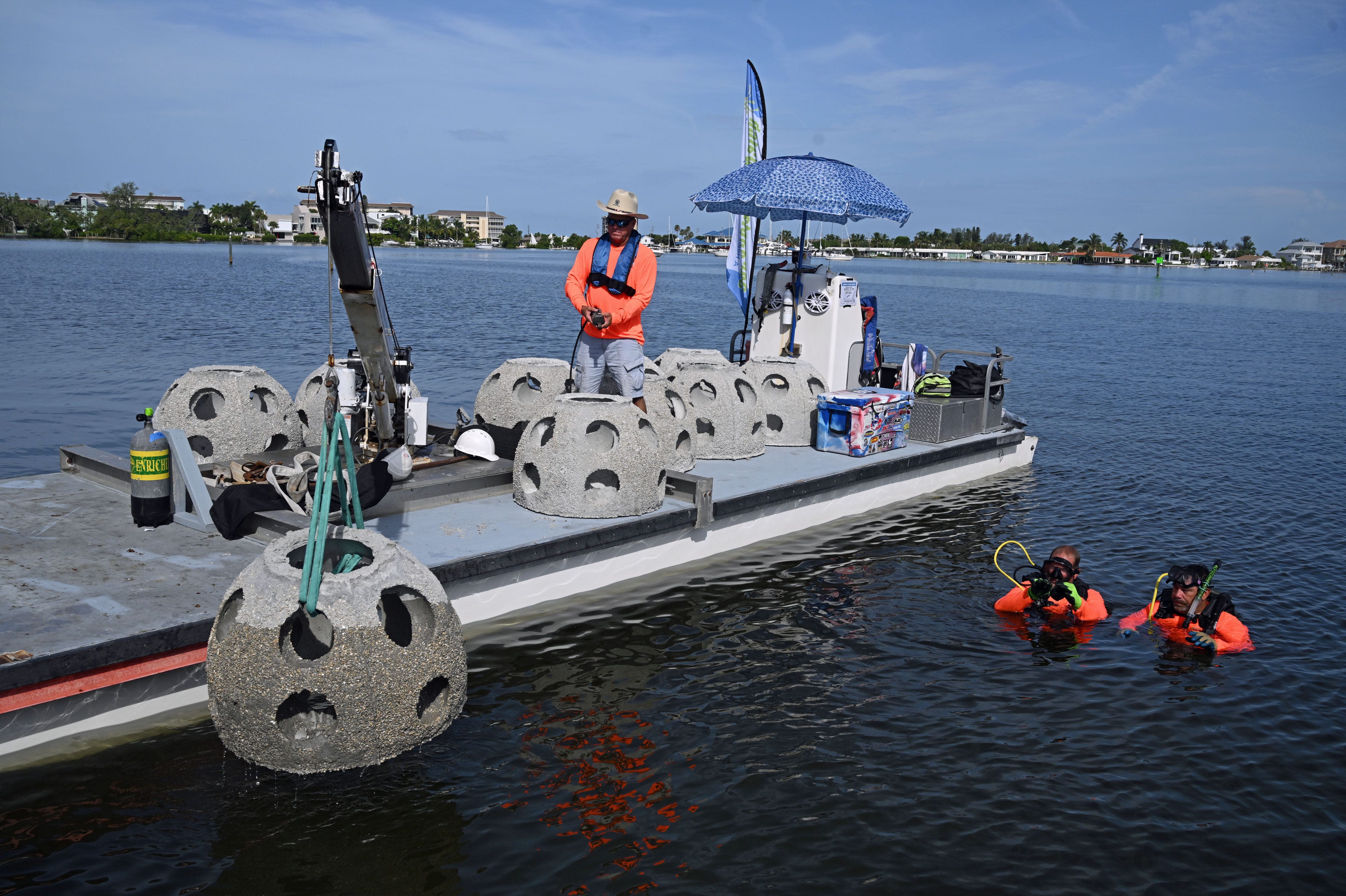 Cleaning up Venice's Roberts Bay one drop at a time: reef balls installed under docks