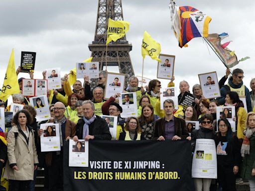 Uyghurs, Tibetans urge France to tackle human rights with Chinese president