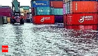 Heavy rain harming exim ops, cargo piles up at ports | Ahmedabad News - Times of India