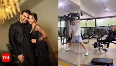 Sshura Khan turns shutterbug as Arbaaz Khan sweats it out in the gym | - Times of India