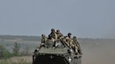 Russia amassing tens of thousands of troops around key Ukrainian town