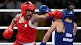 Imane Khelif: Boxing boss says Olympics is 'destroying women's sports' - as Algerian boxer in gender row guaranteed bronze in Paris