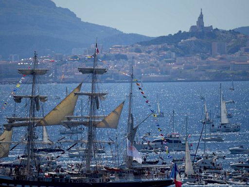 Olympic torch begins journey across France after festive welcome in port city of Marseille