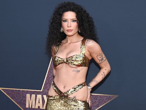 Halsey Wears Daring Gold Gown With Hip Cutouts at MaXXXine Premiere