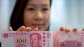 China's state-run banks are swapping dollars for yuan as officials tell them to intervene in currency markets