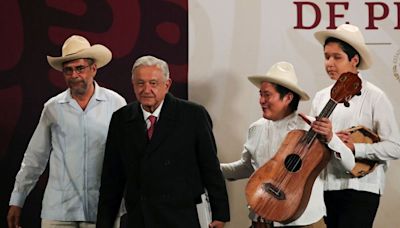 Mexico's Lopez Obrador raffles his watch in colorful final press conference