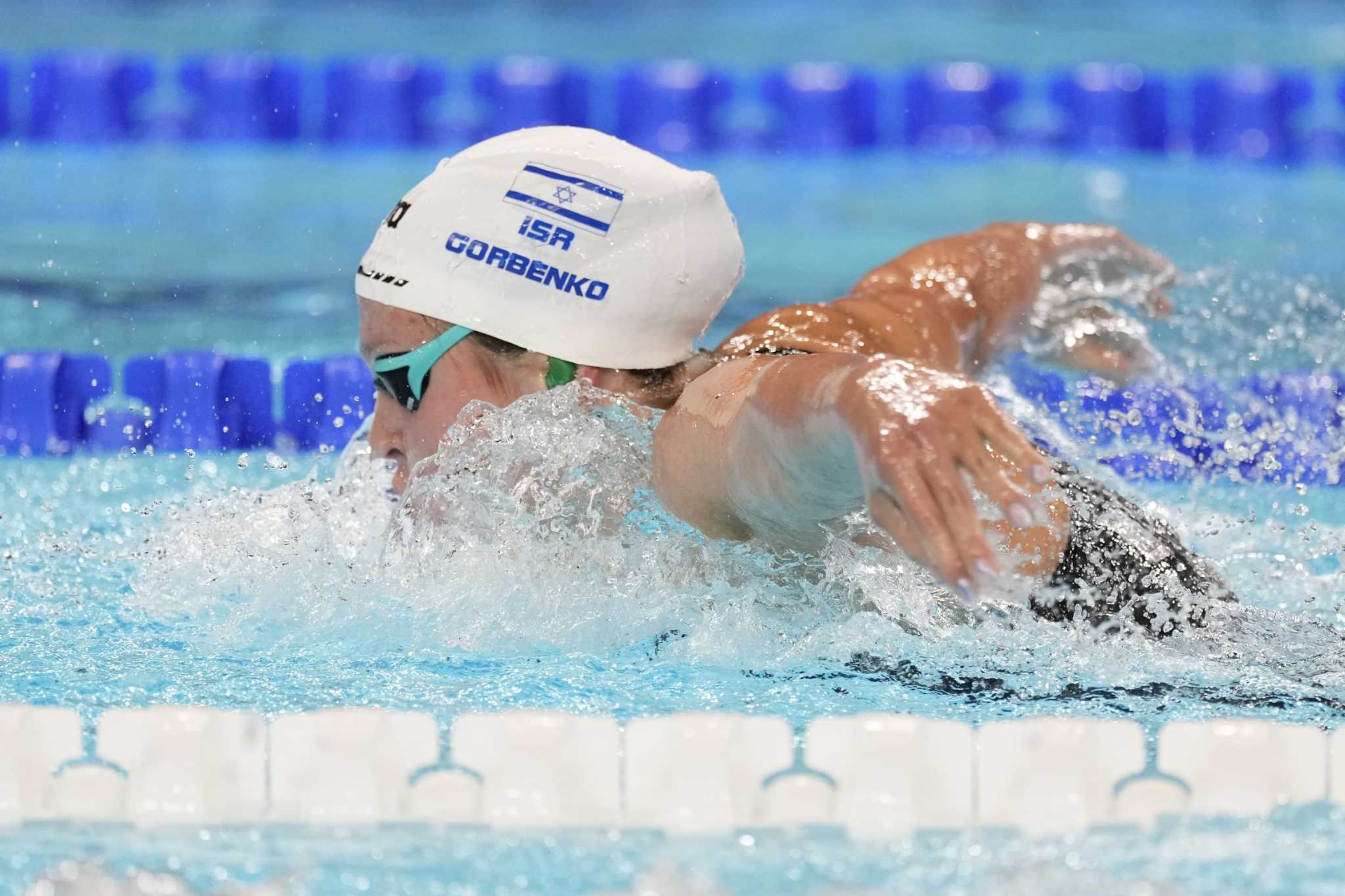 Israeli swimmer of Ukrainian parents tries to forget conflicts as she competes at the Olympics