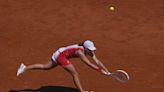 No. 1 Iga Swiatek loses to Zheng Qinwen of China in the semifinals at the Paris Olympics