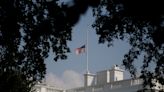 White House wobbles on US flag after McCain death