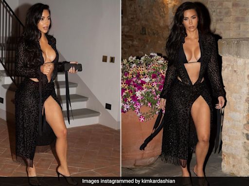 When Kim Kardashian "Entered The Villa" She Stole The Show In This Black Swim Set Dress Combo