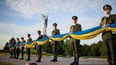 Largest ever Ukrainian flag, signed by country’s soldiers, displayed in Kyiv