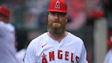 Angels P Archie Bradley fractured elbow by falling over dugout railing during Mariners brawl