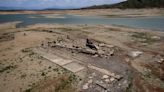 Parched Philippine dam reveals centuries-old town, luring tourists