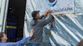 Coronagraph Team Signs Flag Farewell