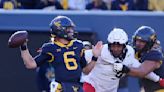 Jahiem White and Garrett Greene run wild in West Virginia's 42-21 romp over Cincinnati