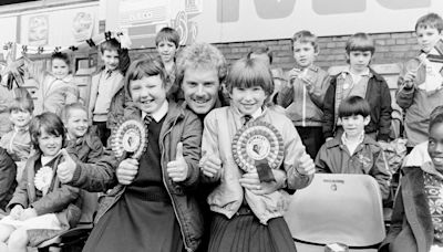 School kids give the thumbs up to the Hornets' cup final hopes