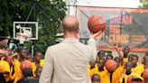 Harry enjoys game of basketball as he continues tour of Africa with Meghan