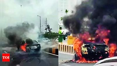 Car Fire on Parthala Flyover in Greater Noida | Noida News - Times of India