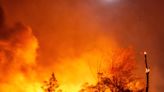 California wildfire puts 1,300 homes at risk as Santa Ana winds whip flames