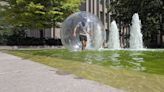 Man walks on water in giant bubble to protest the loss of a Toronto beach