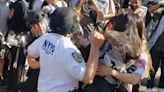 ‘Over the top’ cop in Brooklyn caught on camera punching pro-Palestine protesters during museum scuffle | amNewYork