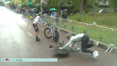 Olympics cyclist crashes three times in rain... as team mechanic gets in on act