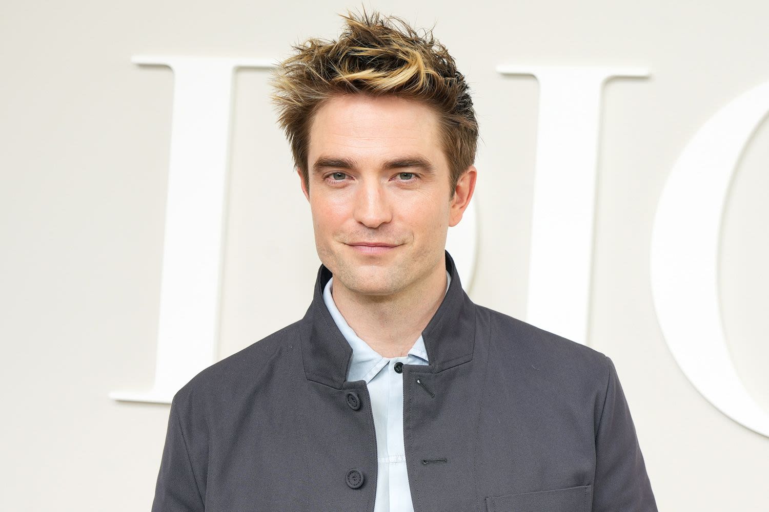 Robert Pattinson Debuts Frosted Tips at Dior Men’s Show and Levels Up His Status as Cool Dad