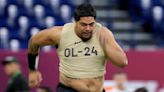 Saints sign their top draft choice, offensive tackle Taliese Fuaga