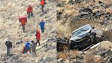 Woman survives crash hundreds of feet down canyon