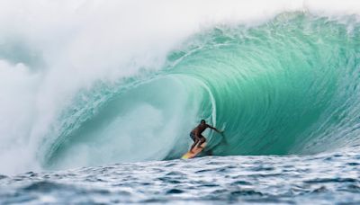 Former pro surfer known for riding huge Pipeline waves dies in shark attack while surfing off Oahu