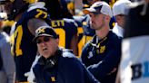 Coach Jim Harbaugh banned from 3 games over sign-stealing allegations. Michigan asks judge for stay