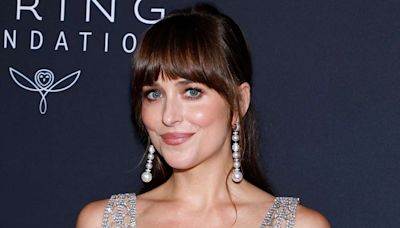 Dakota Johnson’s Preppy Sweater Combines 2 of Hollywood's Biggest Trends We're Seeing Right Now