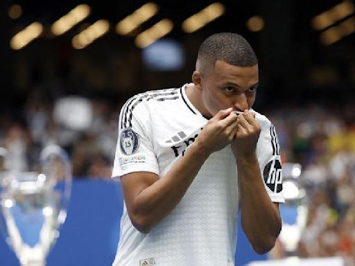 Kylian Mbappe put on Real Madrid jersey, fulfilling his childhood dream in front of a packed Santiago Bernabeu Stadium