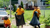 Boys and Girls Club members clean up streets near their Bellemeade Avenue location